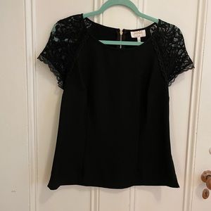 Laundry Top. Exposed zipper in back.